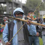 Anti-Trump protesters fire arrows at Colombian police, injuring four