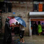Heavy rains kill at least 22 in Nepal, block roads | Reuters