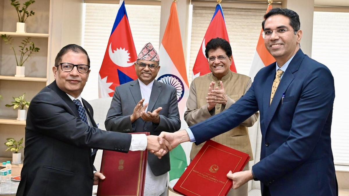 india,-nepal-ink-pact-to-step-up-commerce-ties