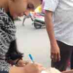 A small fledgling library in Chennai: residents  donate books, shopkeepers watch over it