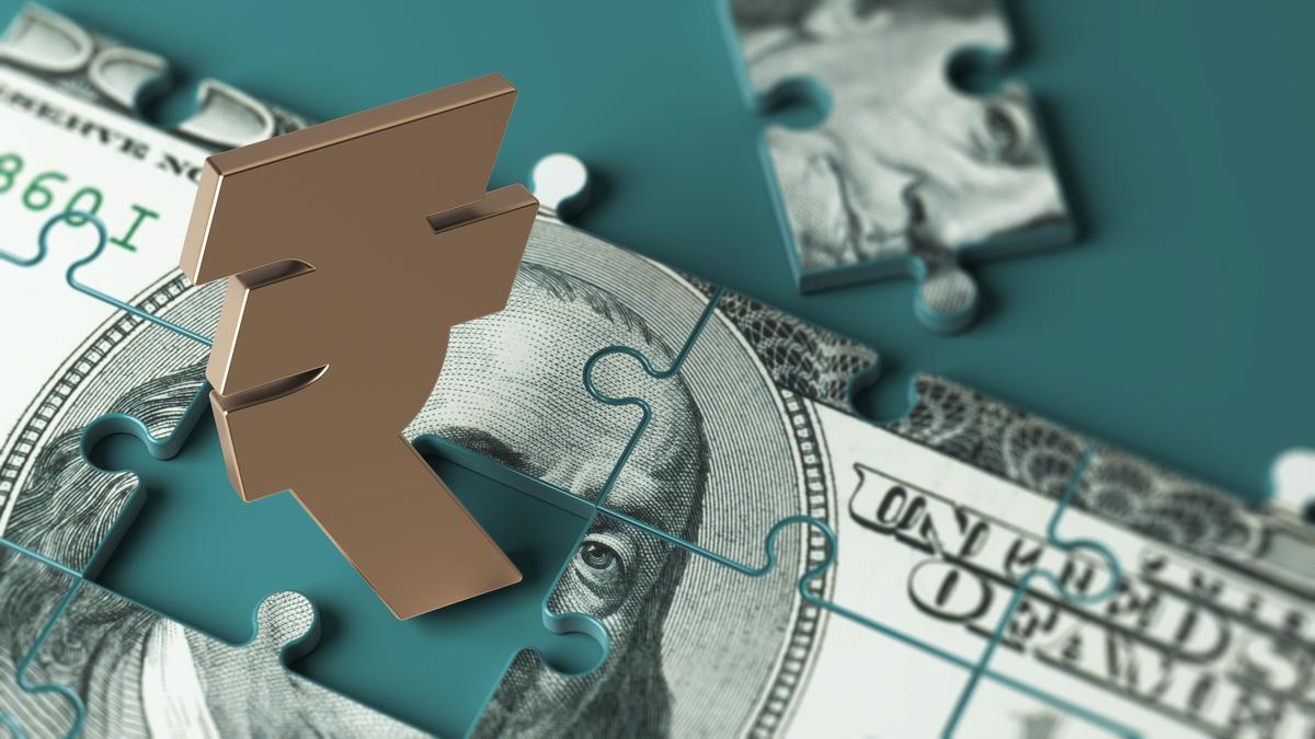 rupee-falls-14-paise-to-close-at-9009-against-us.-dollar