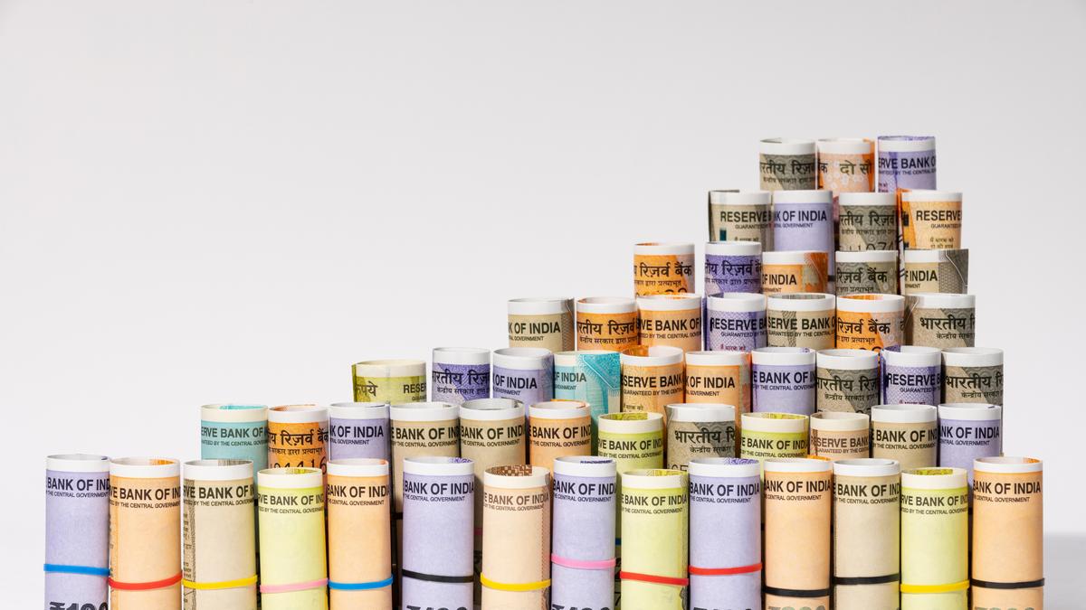 rupee-slips-past-90-level-mark,-settles-22-paise-down-at-9020-against-us.-dollar