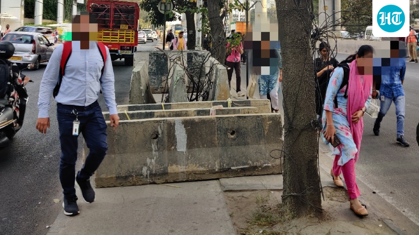storage-first,-walkability-last:-bengaluru-woman-flags-concrete-barriers-blocking-footpath
