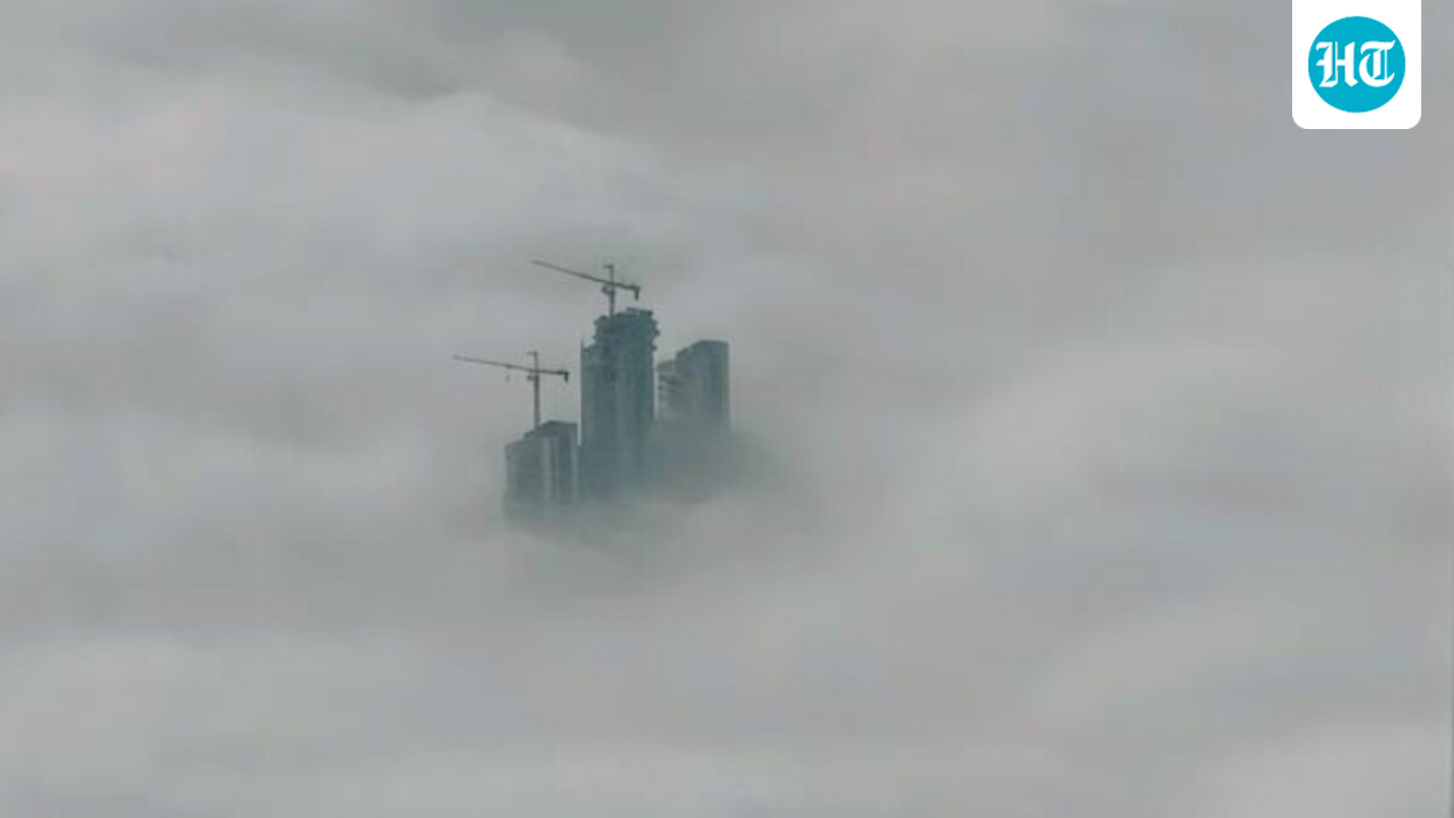ex-jet-airways-ceo-shares-stunning-picture-of-noida-high-rise-towers-peeking-through-fog:-‘peaking-and-peeking’