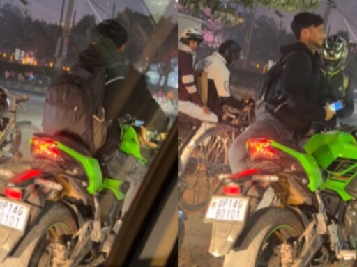 biker-pauses-at-traffic-signal-to-let-cyclist-pose-with-his-superbike,-internet-applauds-the-gesture