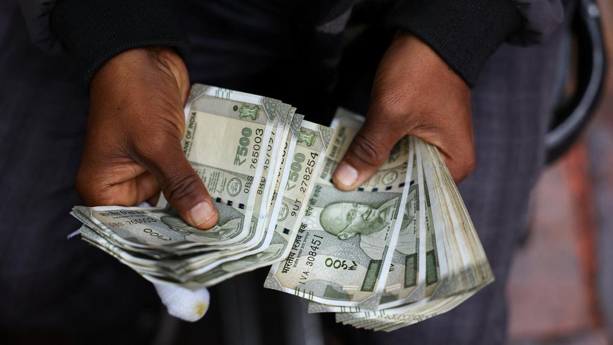 Rupee rises 9 paise to close at 90.57 against U.S. dollar