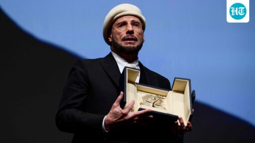 john-travolta-breaks-down-in-tears-after-getting-surprise-honorary-palme-d’or-at-cannes-film-festival:-beyond-oscar